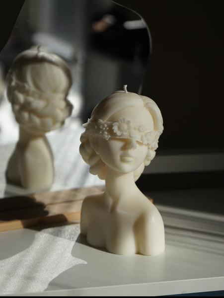 Blindfolded Women Candle